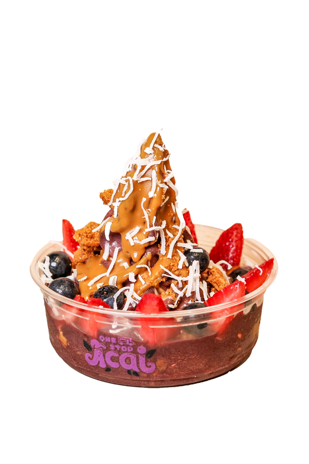 A clear plastic bowl filled with açaí soft serve, topped with a generous drizzle of peanut butter, shredded coconut, fresh strawberries, blueberries, and crumbled cookie pieces. The bowl is branded with the 'One Stop Açaí' logo in purple."